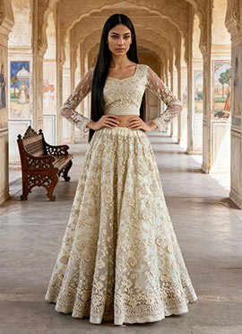 Flawlessly Crafted White Net Lehenga With Stunning Embroidered And Stone Work