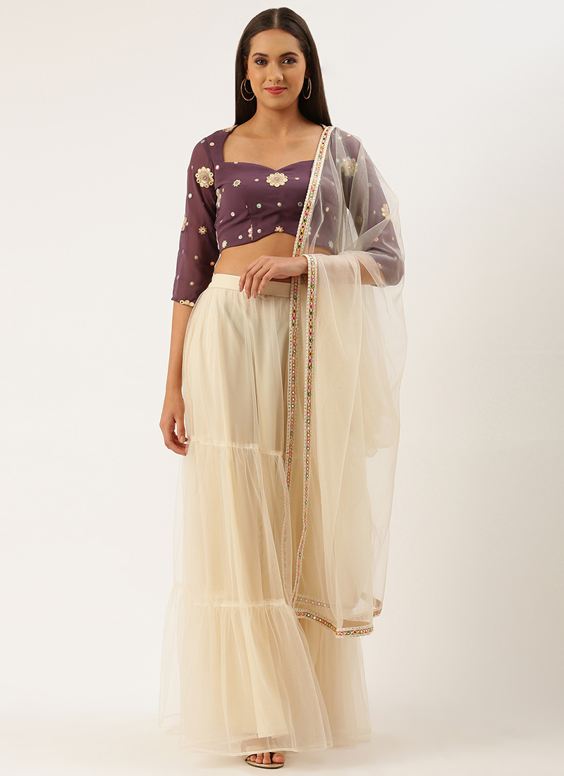 white lehenga with black blouse
