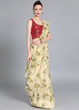 Red Sleeveless Blouse and Foil Printed Saree