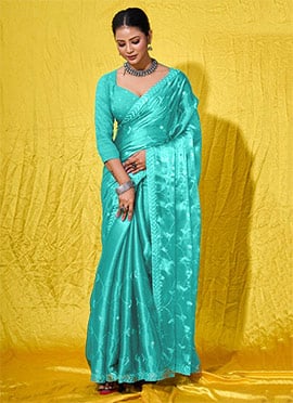 Turquoise Organza Saree Embossed With Embroidered And Sequins