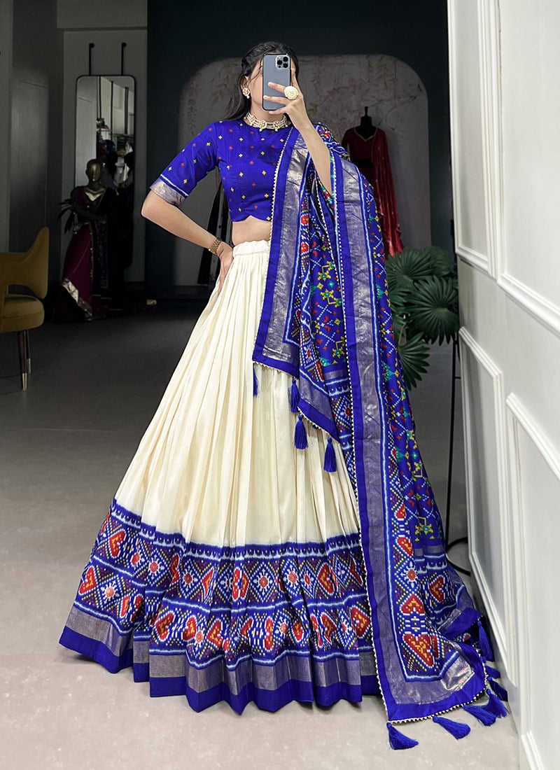 Alluring Cream Tussar Silk Patola Print Lehenga Festive Wear