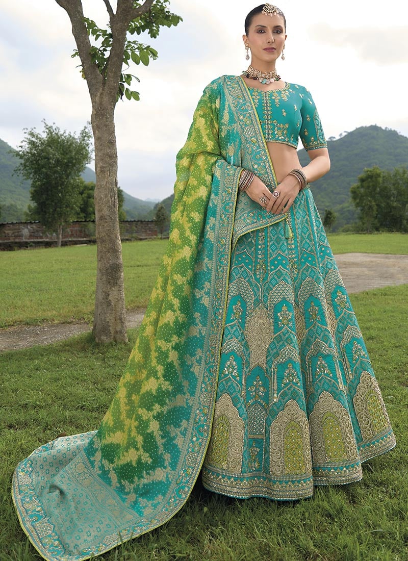 Aqua Blue Silk Zari Thread Embroidered With Stone Sequins Ravishing Lehenga Wedding Wear