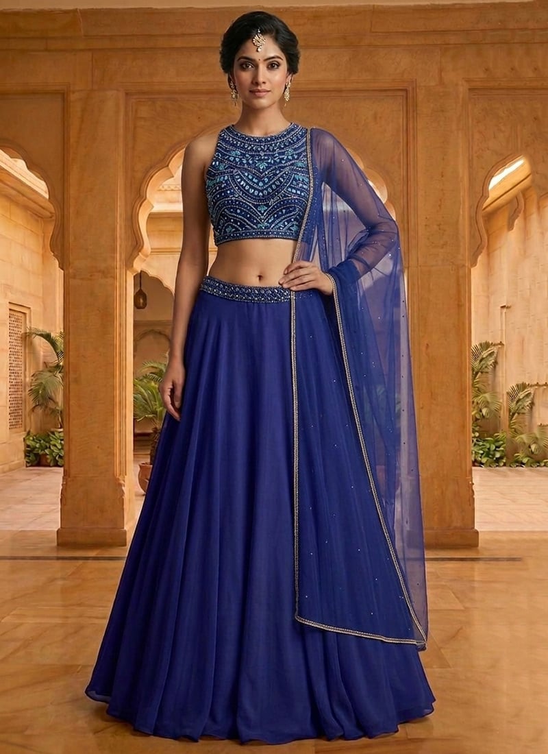 Blue Georgette Hand Embroidered With Beads And Stone Work Lehenga Wedding Wear