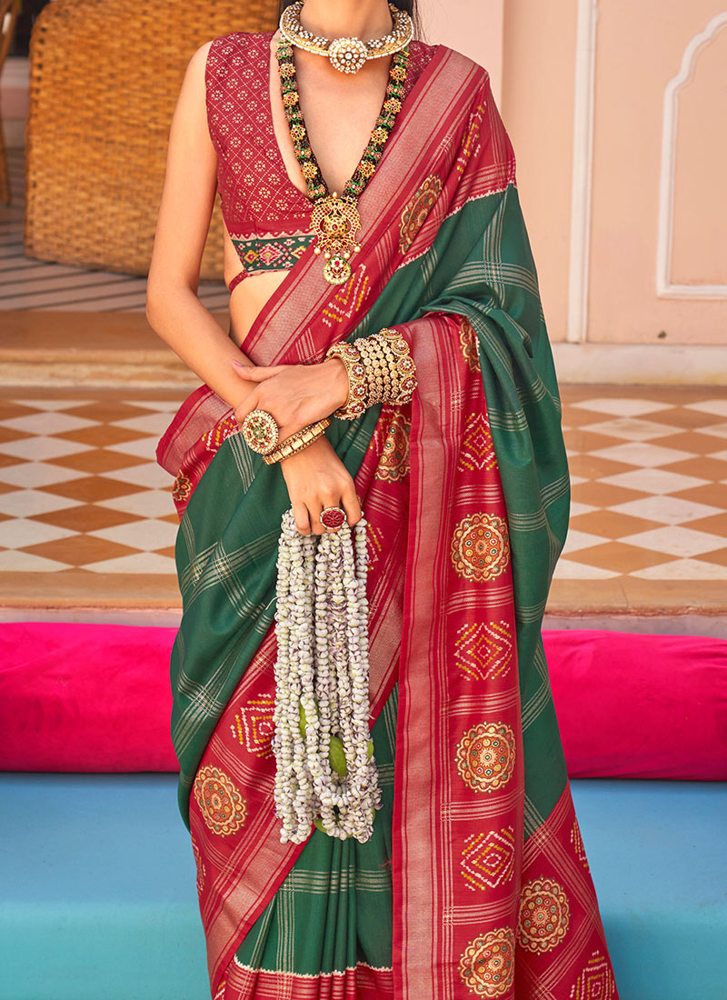Bottle Green Floral & Paisley Zari Motifs Jute Silk Saree With Tassels