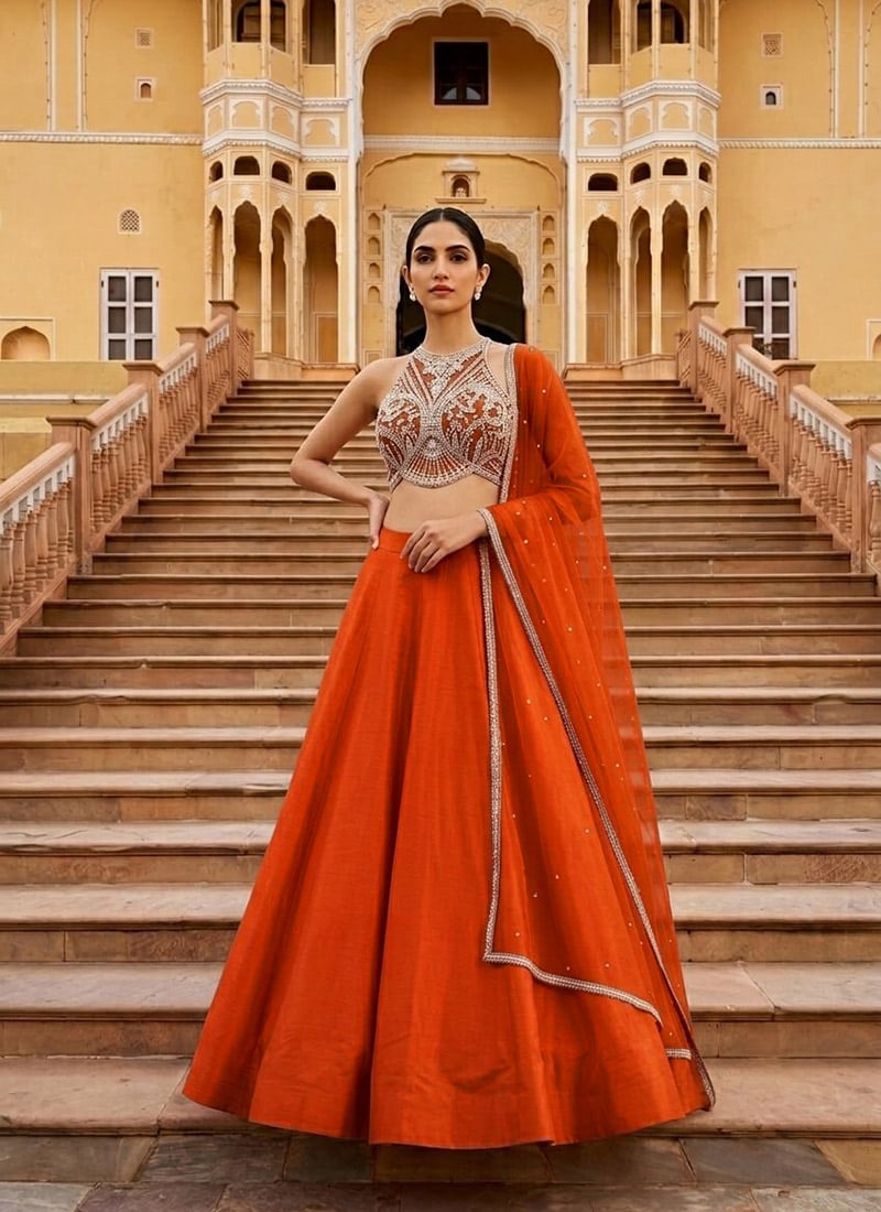 Bright Orange Silk Cutdana Sequins Hand Embroidered Halter Neck Lehenga Festive Wear