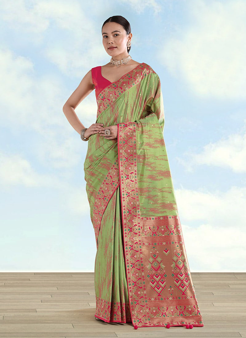 Charming Light Green Banarasi Tissue Silk Zari Woven Paithani Saree Festive Wear