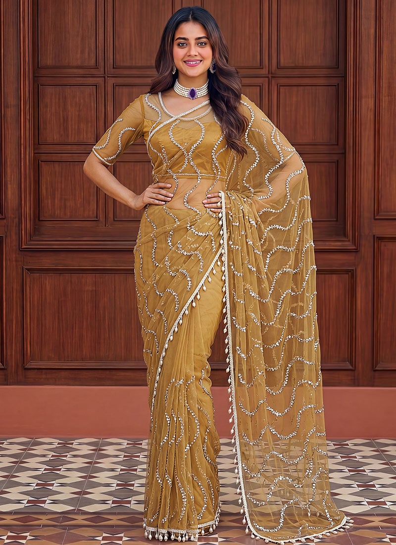 Charming Mustard Net Sequins Saree After Six Wear