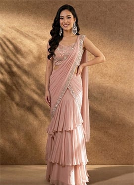 Charming Peach Georgette Sequins Hand Embroidered Cutdana Saree