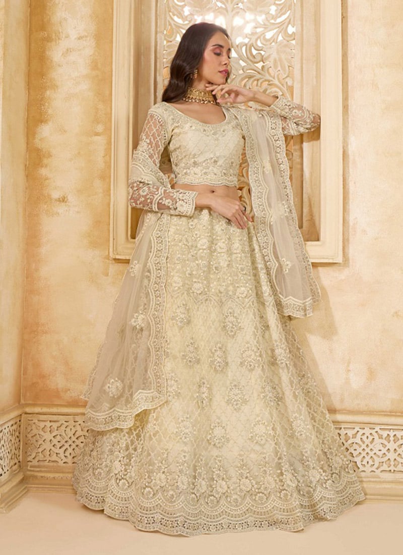Chic White Net Lehenga With Embroidered And Stone Work Wedding Wear