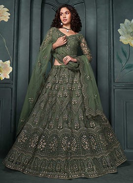 Dazzling Dust Green Net Lehenga With Lavish Stone Embellishments