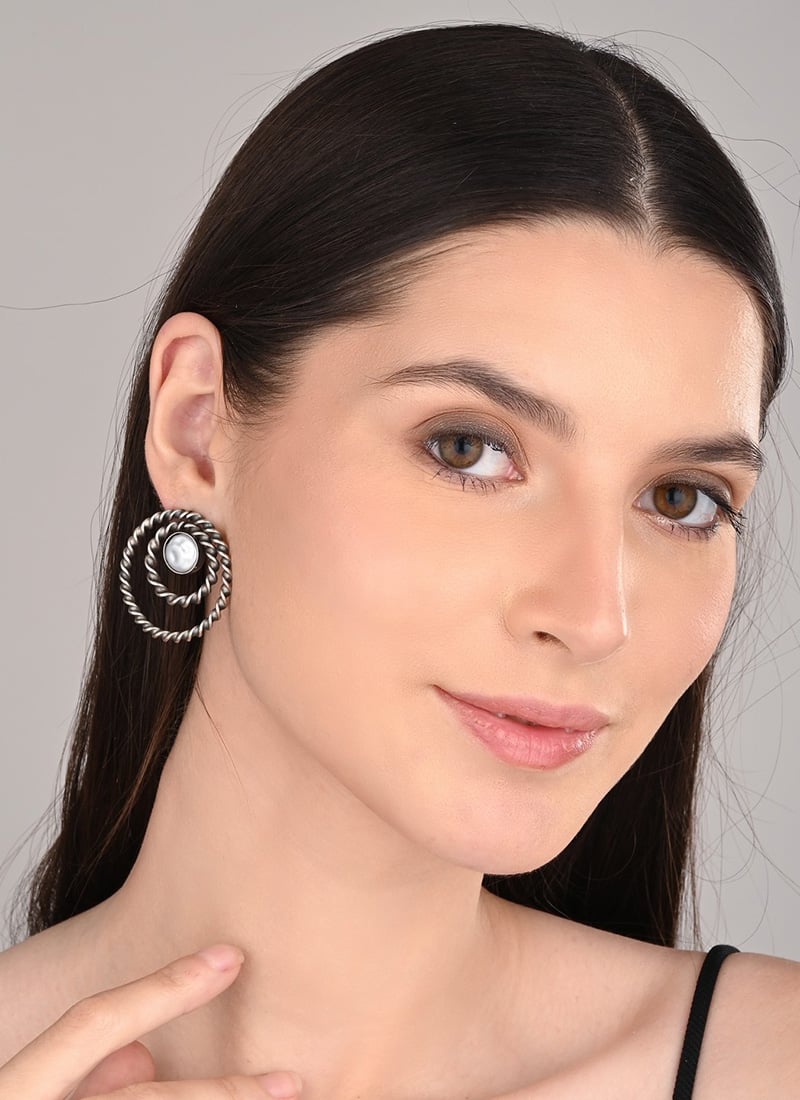 Delicate Silver Stone Studs After Six Wear