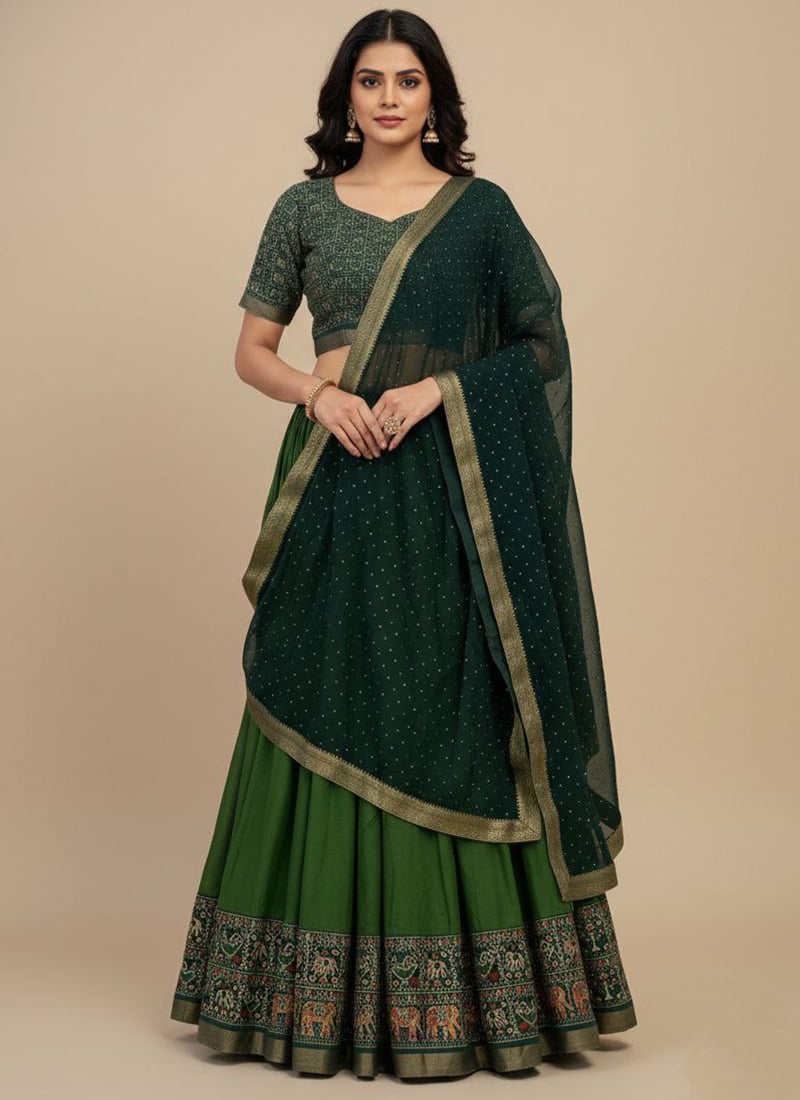 Elegant Green Mul Mul Cotton Patola Print Zari Umbrella Lehenga Wedding Wear