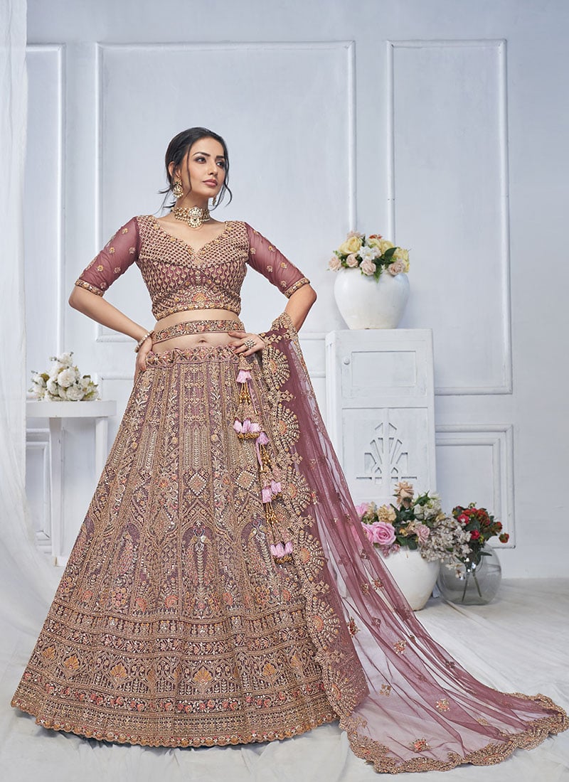 Elegant Purple Net Zarkan Work Zari Embroidered And Stone Sequins Lehenga Wedding Wear