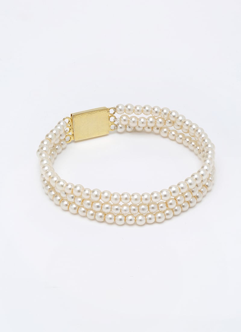 Elegant White Pearls Gold Plated Hand Bracelet Festive Wear