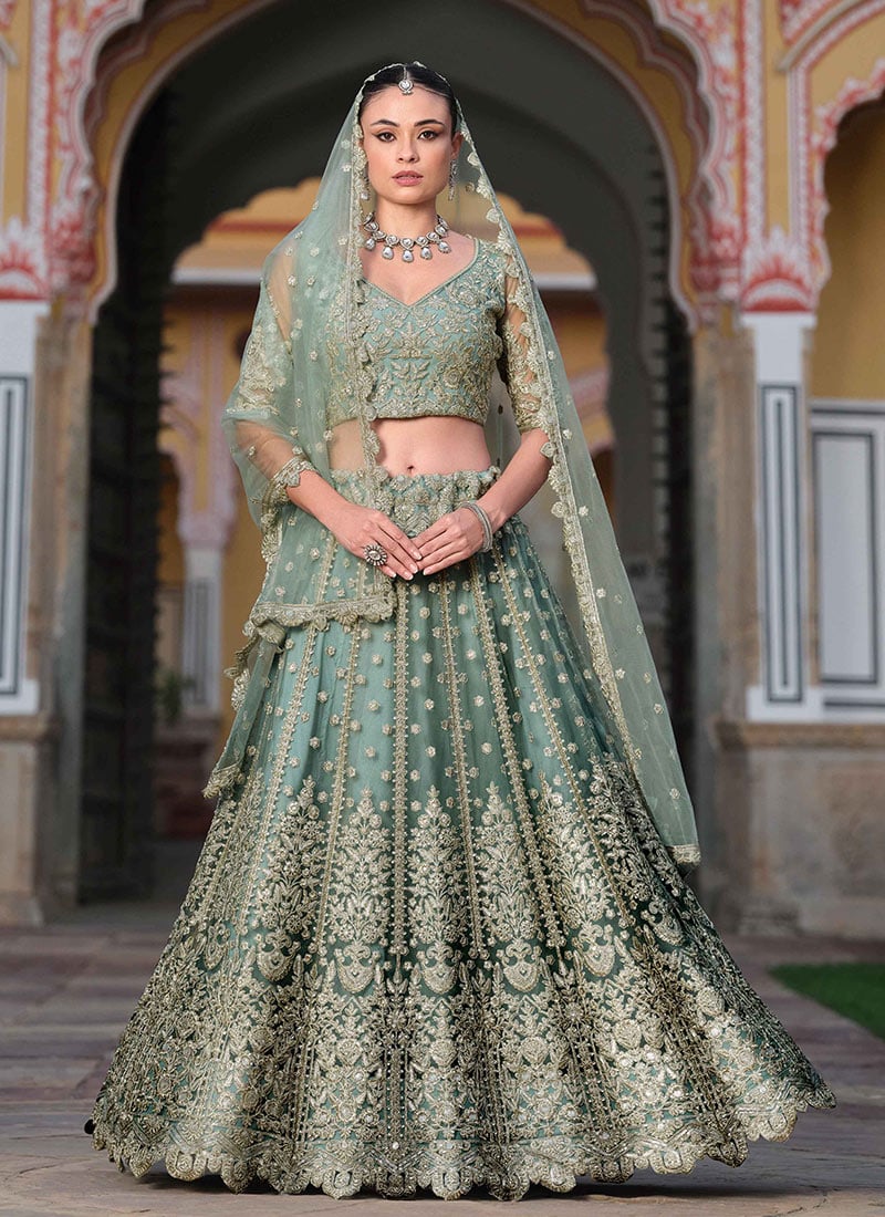 Enchanting Mint Green Net Lehenga With Stone Sequins And Thread Embroidery Wedding Wear