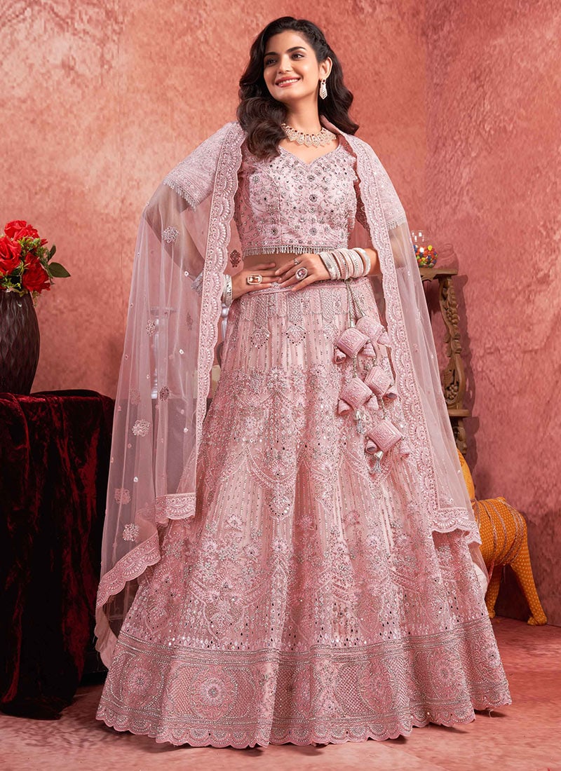 Feminine Allure In Pink Net Zari Thread Zarkan Embroidered Sequins Lehenga Wedding Wear