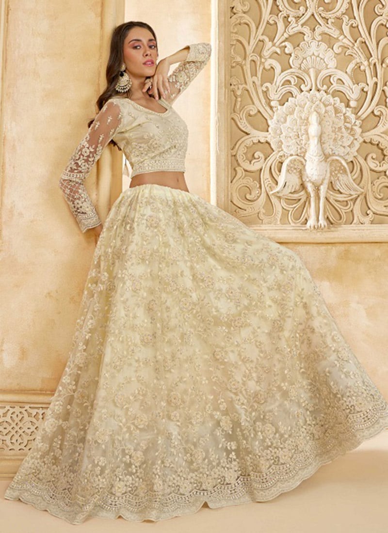 Flawlessly Crafted White Net Lehenga With Stunning Embroidered And Stone Work Wedding Wear