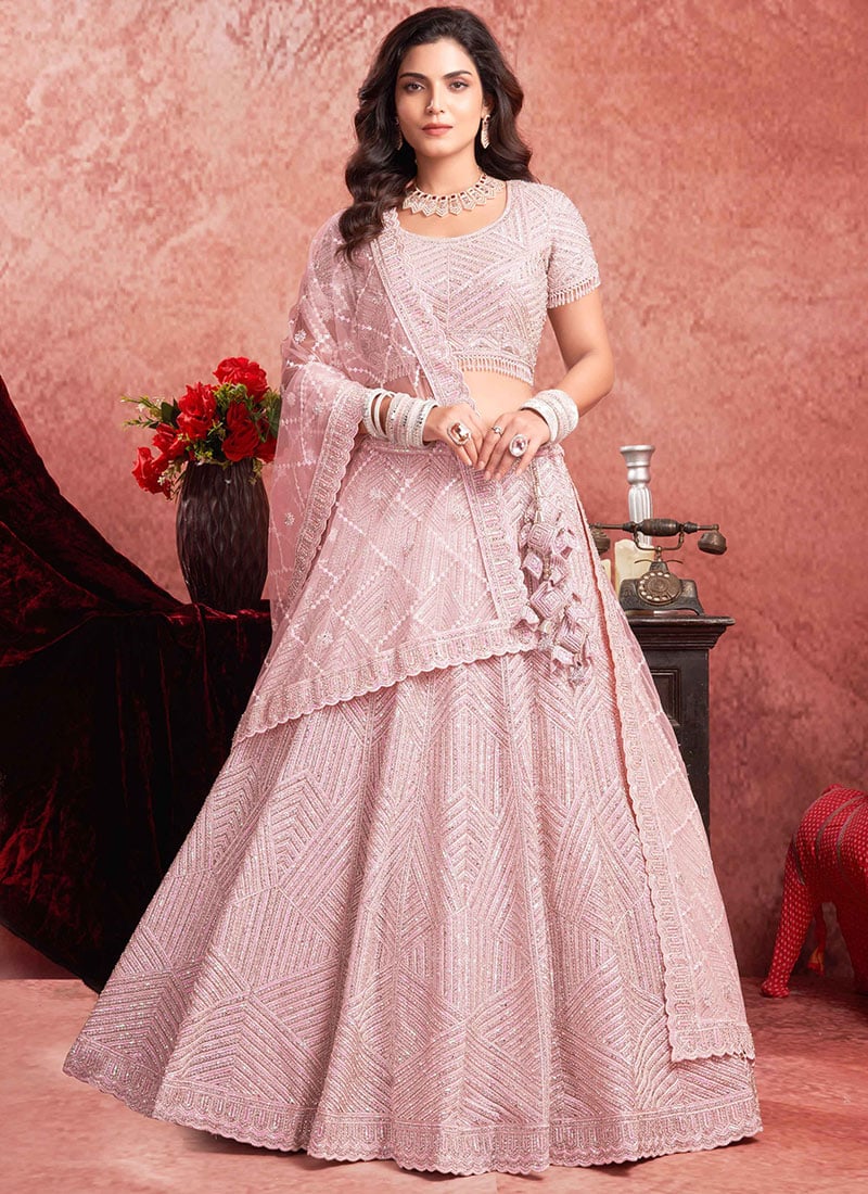 Glistening Glamour In Pink Net Zari Thread Zarkan Embroidered Sequins Lehenga Wedding Wear
