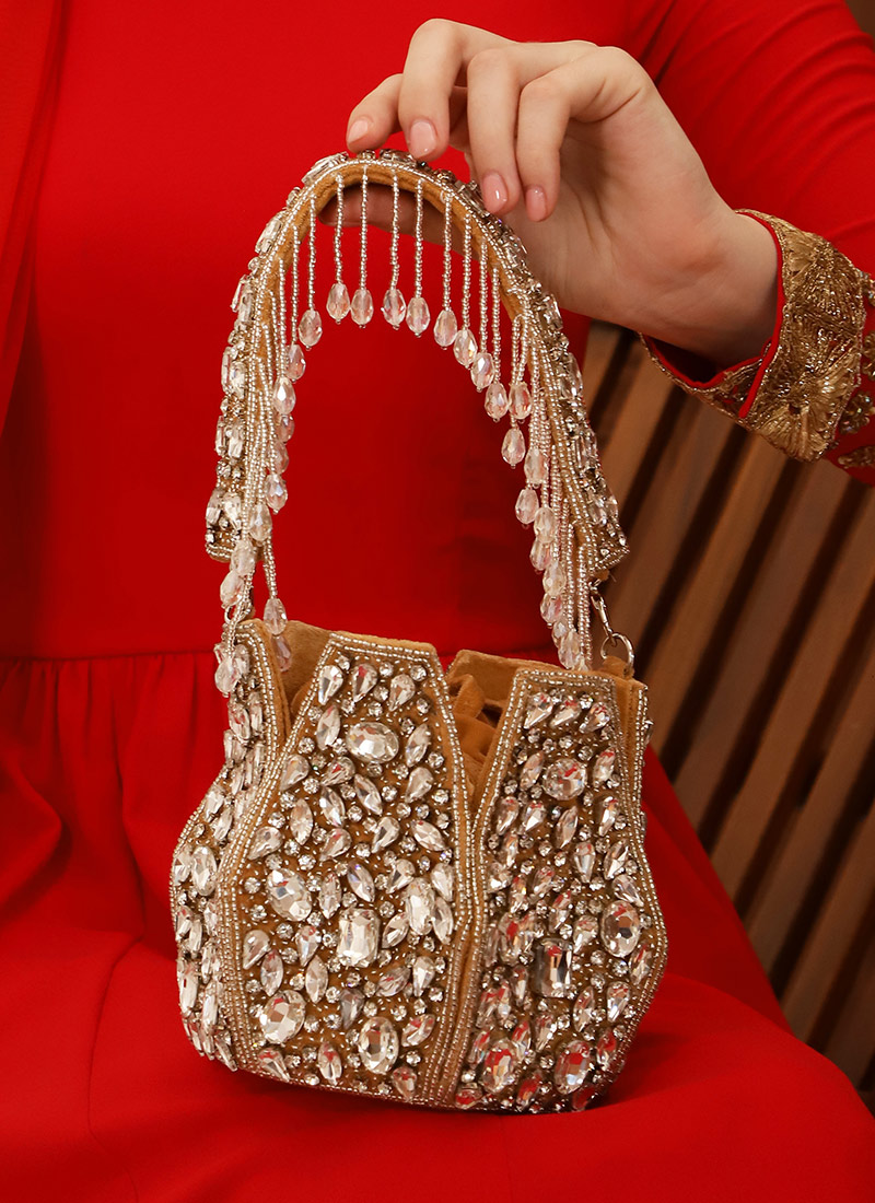 Gold Velvet Potli Embossed With Crystals And Moti Party Wear