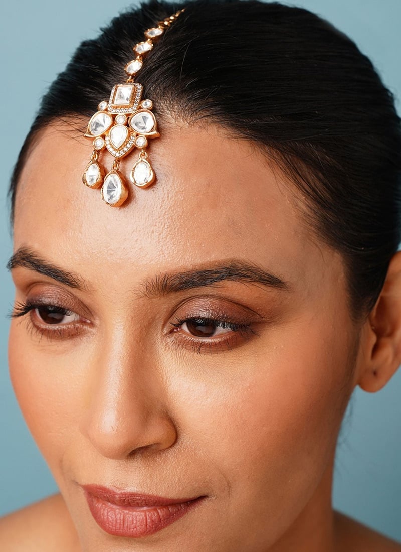 Golden Plated Kundan And Stone Work Mangtikka Festive Wear
