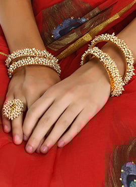 Golden Plated Off White Alloy Beads Bangles