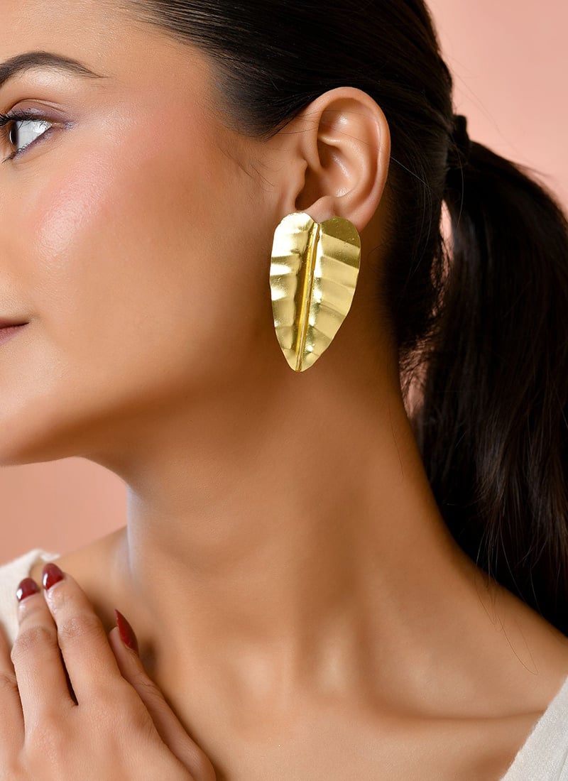 GoldenTextured Studs After Six Wear