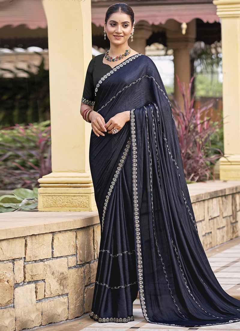 Grace In A Mid Night Blue Shimmer Chiffon Stone Embossed Saree Festive Wear