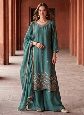 Graceful Deep Teal Rangoli Crush Fabric Embroidered Zari Palazzo Suit