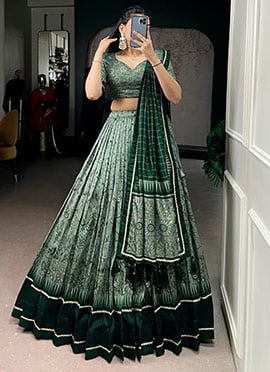 Graceful Green Tussar Silk Kalamkari Print With Lace Border Umbrella Lehenga