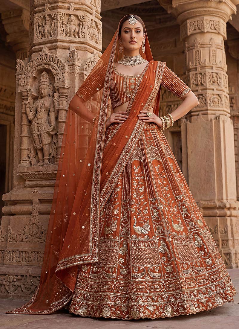 Graceful Orange Silk Sequins Stones Zari Hand Embroidered Peacock Thread Umbrella Lehenga Wedding Wear