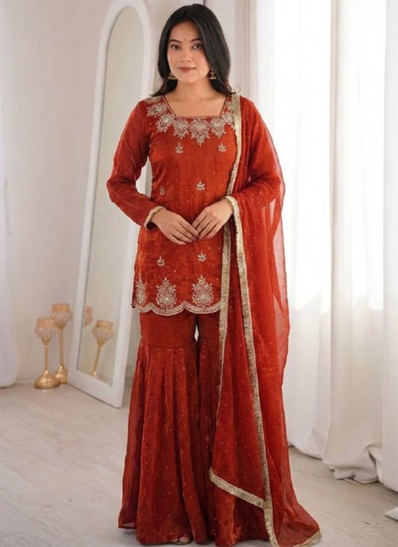 Graceful Rust Fendy Silk Embroidered Stones Sequins Sharara Suit Festive Wear