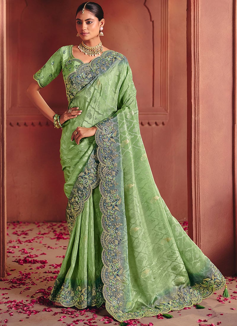Green Silk Zari Woven Embroidered Sequins Saree Wedding Wear