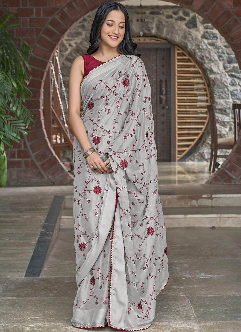 Grey Faux Georgette Saree Embossed With Embroidery And Sequins Party Wear