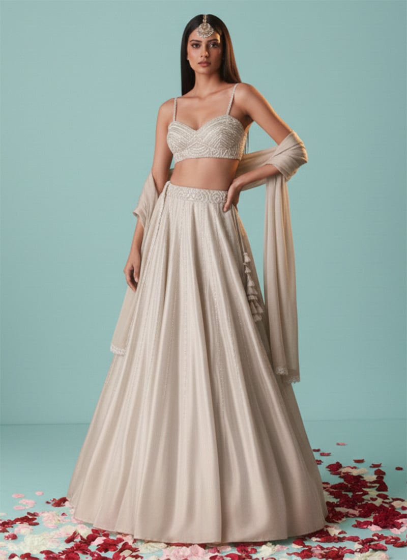 Ivory Silk Hand Embroidered Stone Work Lehenga Wedding Wear
