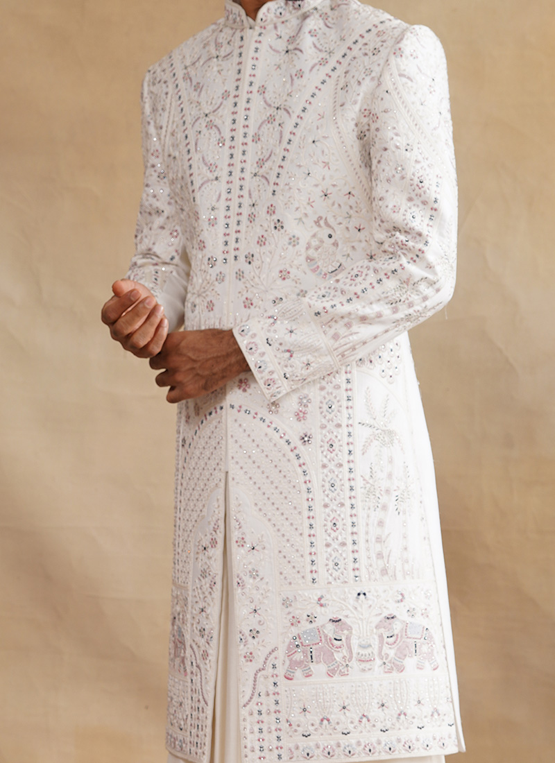 Ivory sherwani detailing with silver zari pearl sequins and thread work