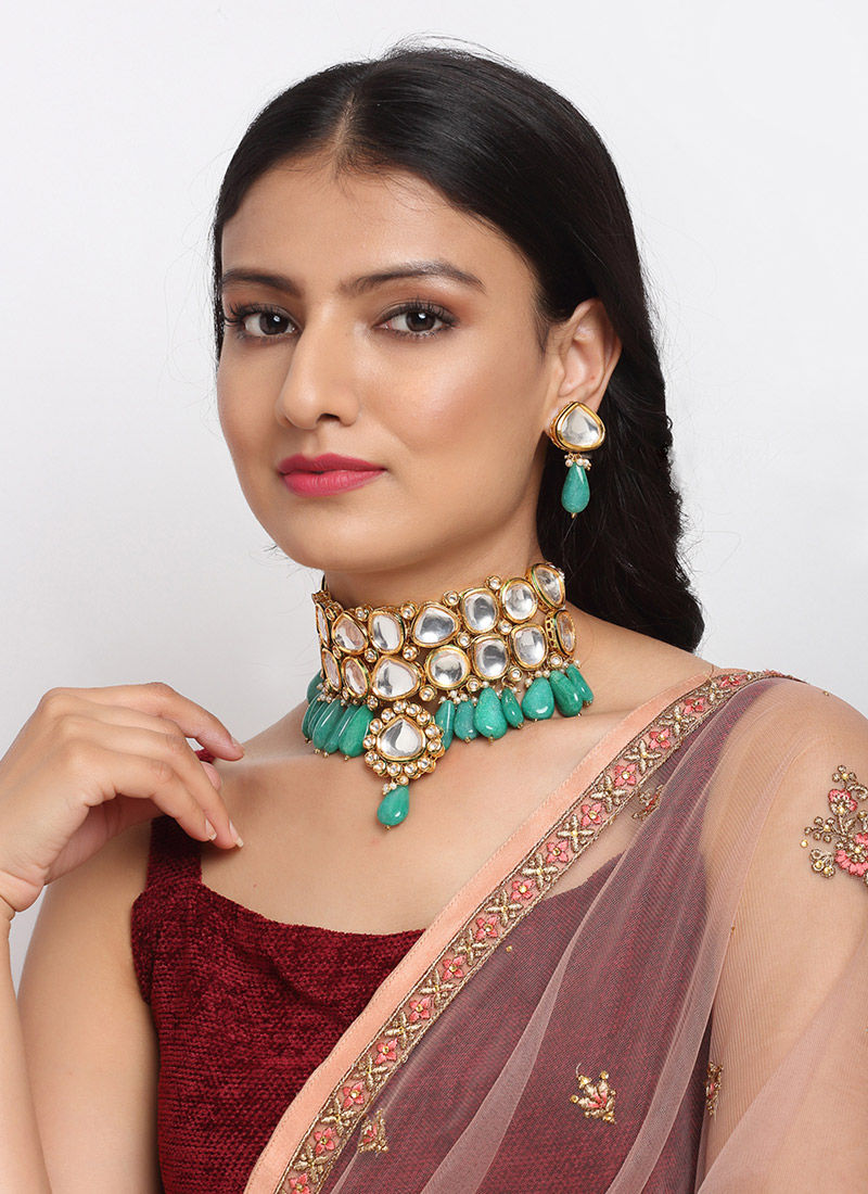 Jewellery For Women In Gold Plated Kundan White Beads Green Stones Choker Party Wear