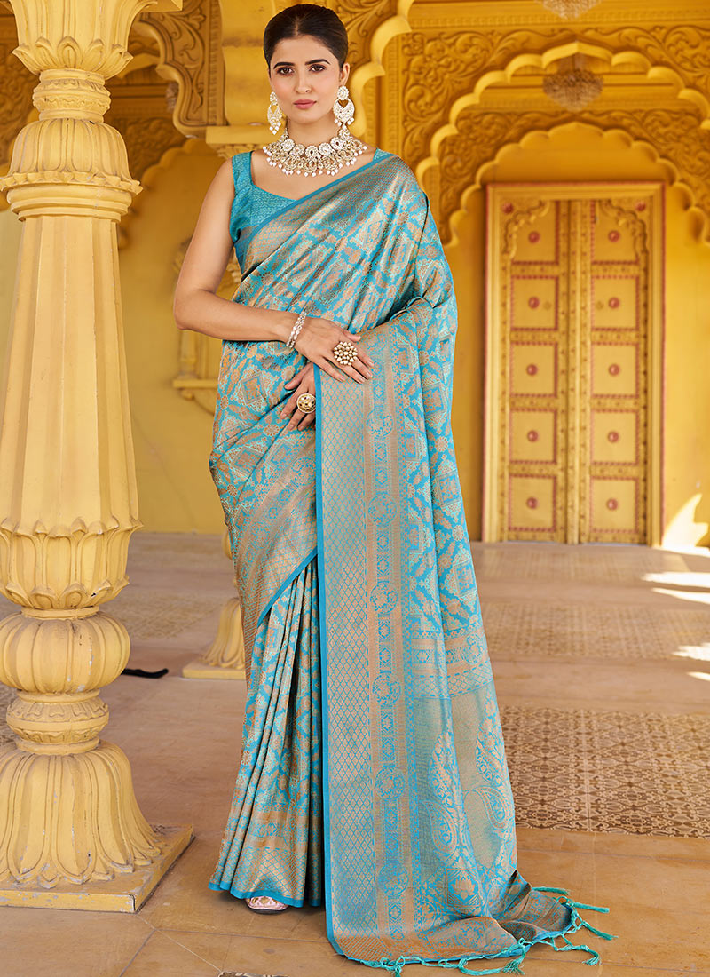 Banarasi Tussari  Saree in Blue with Zari Border. Comes with stitched blouse size 38 can be altered up to 44 main image 1