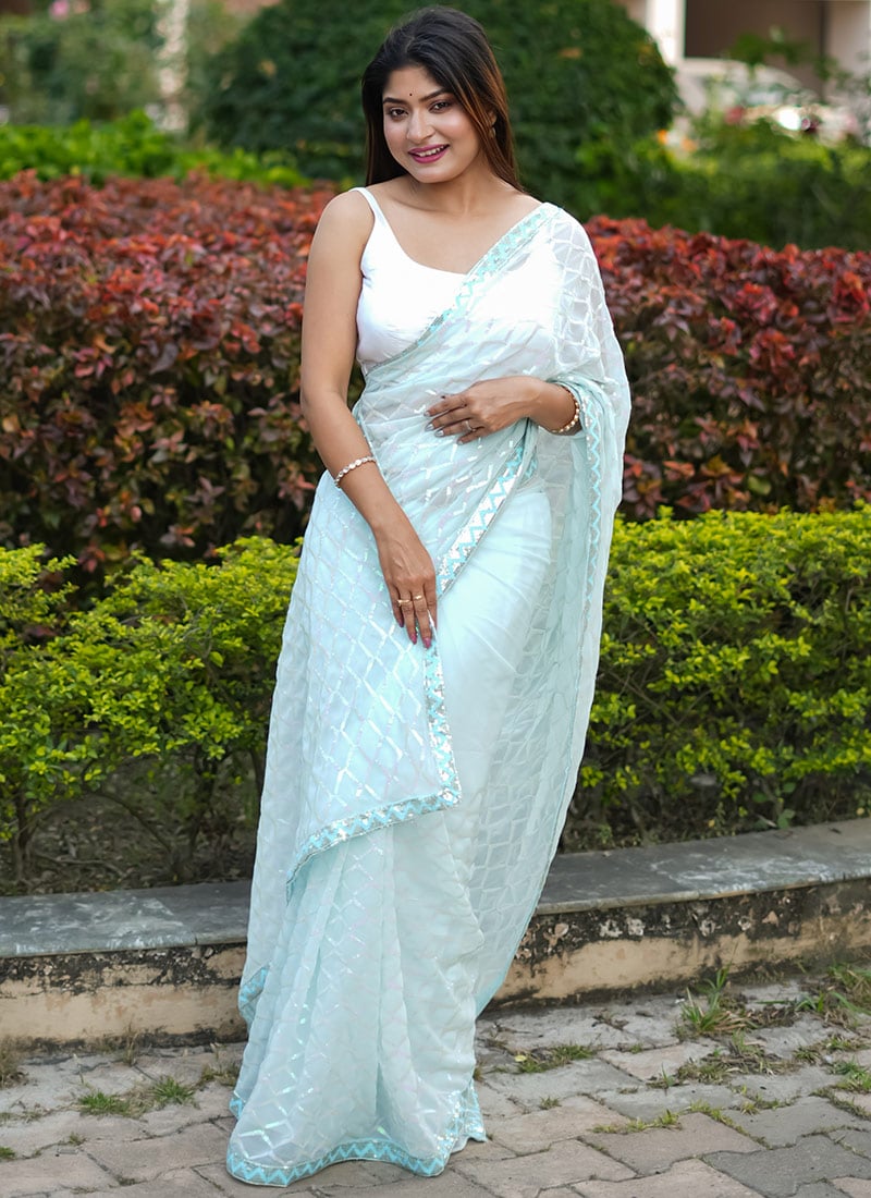 Light Blue Faux Georgette Sequins And Embroidered Saree