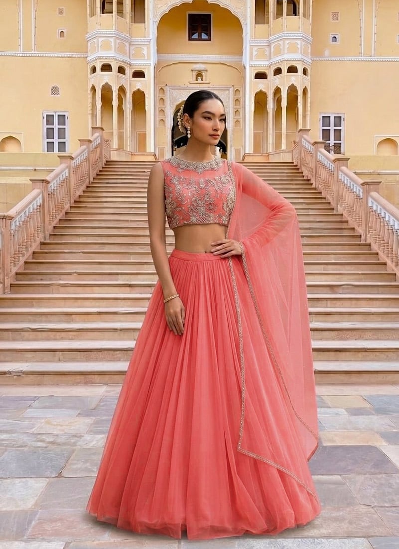Light Coral Pink Net Cutdana Hand Embroidered Sequins Illusion Neck Lehenga Festive Wear
