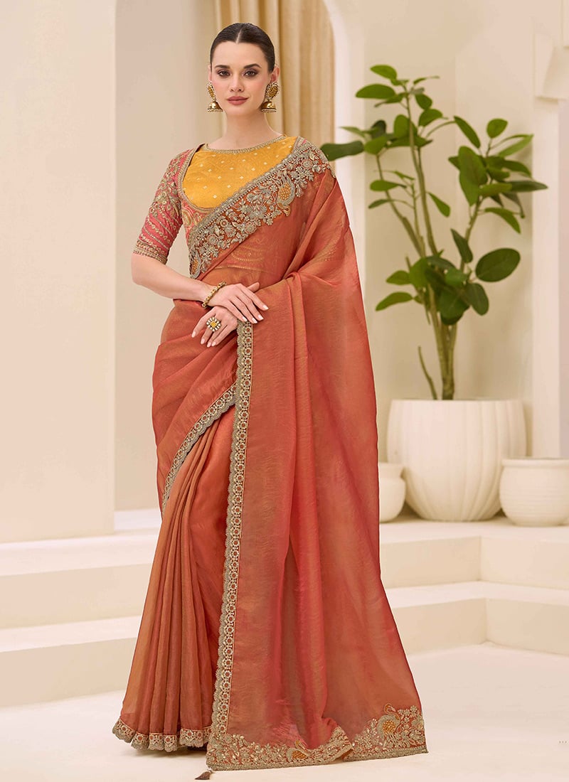 Lustrous Peach Silk Embroidered Sequins Zari Thread Saree Wedding Wear