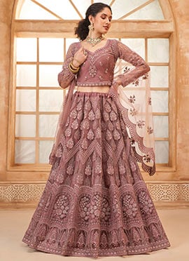 Lustrous Rose Gold Net Embroidered Stone Work Lehenga