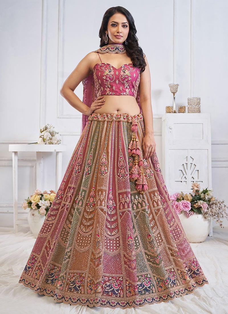 Luxurious Multicolored Net Zarkan Work Zari Embroidered And Stone Sequins Lehenga Wedding Wear