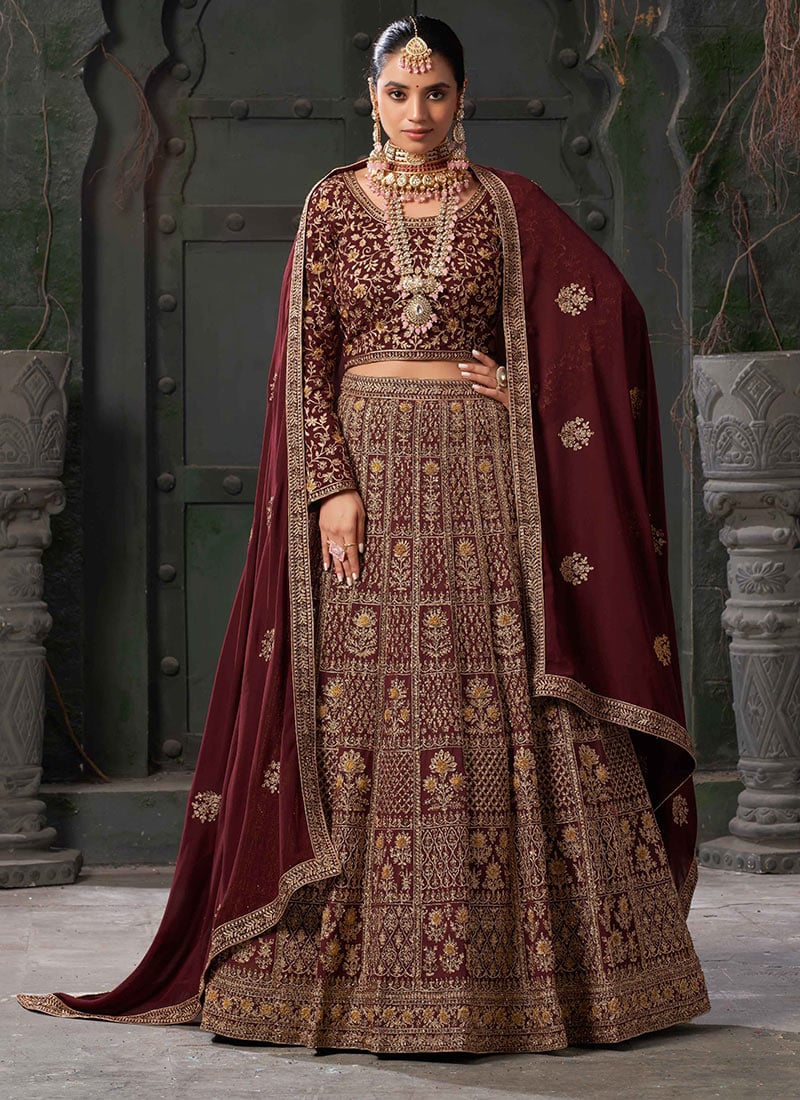 Maroon Faux Georgette Zari Embroidered Stone Work Elegant Lehenga Wedding Wear