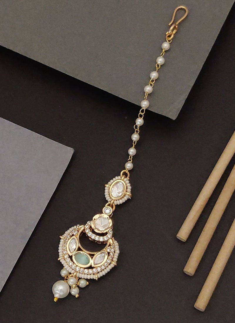 Mesmerizing Golden Kundan And Beads Mangtikka  Festive Wear