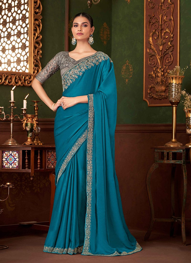 Mesmerizing Teal Chiffon Silk Zari Embroidered Sequins Saree Wedding Wear