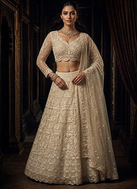 Off White Net Embroidered Sequins Zari Lehenga
