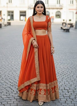 Orange Georgette Zari Umbrella Lehenga Choli