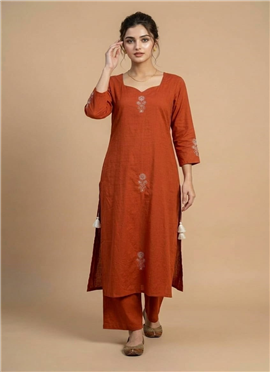 Orange Muslin Cotton Embroidered Kurta Set.