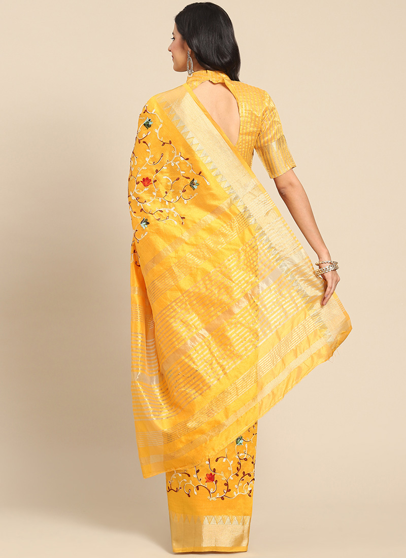 Gold-base marigold flower enclosed jaal jacquard designer saree, contrast scallop embroidered border, and pallu of elephant motifs crafted in stone work main image 0
