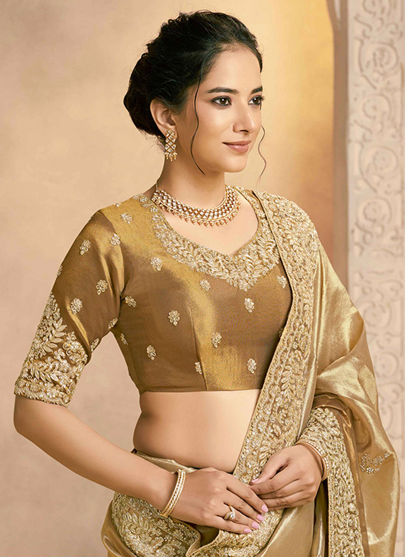 Gold Tissue Silk Saree with Jardosi and Diamond Embellishment & Green Embroidered Blouse main image 0